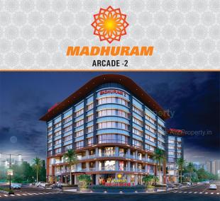 Elevation of real estate project Madhuram Arcade located at Surat, Surat, Gujarat